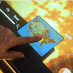 Students can scan interactive maps on Microsoft Surface.